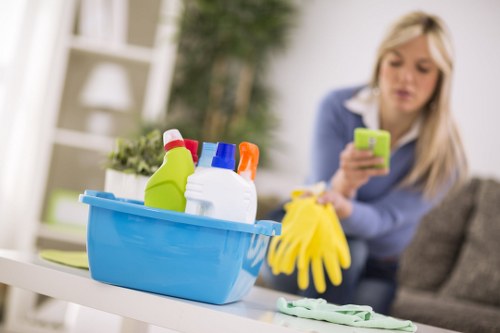 Cleaner mopping a polished office floor